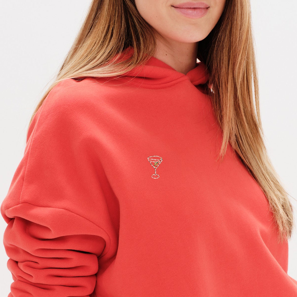 Premium orange hoodie with a martini embroidery