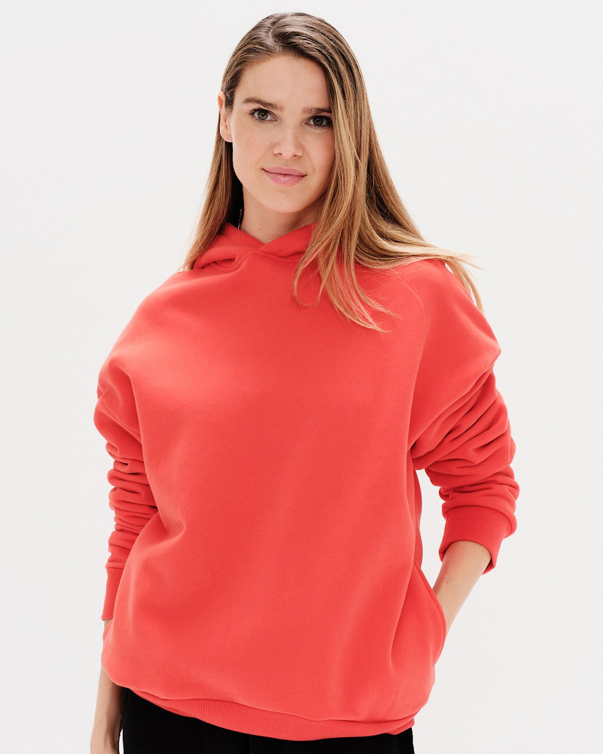 Woman wearing a orange hoodie