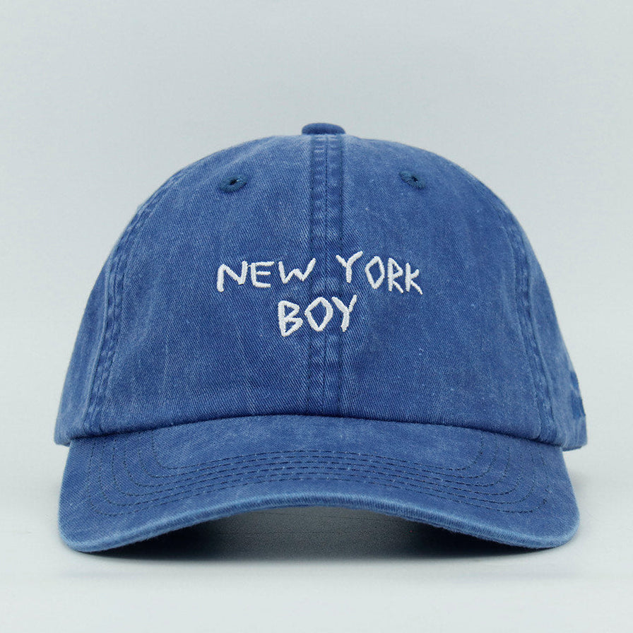 Blue cap with 'New York Boy' embroidered text