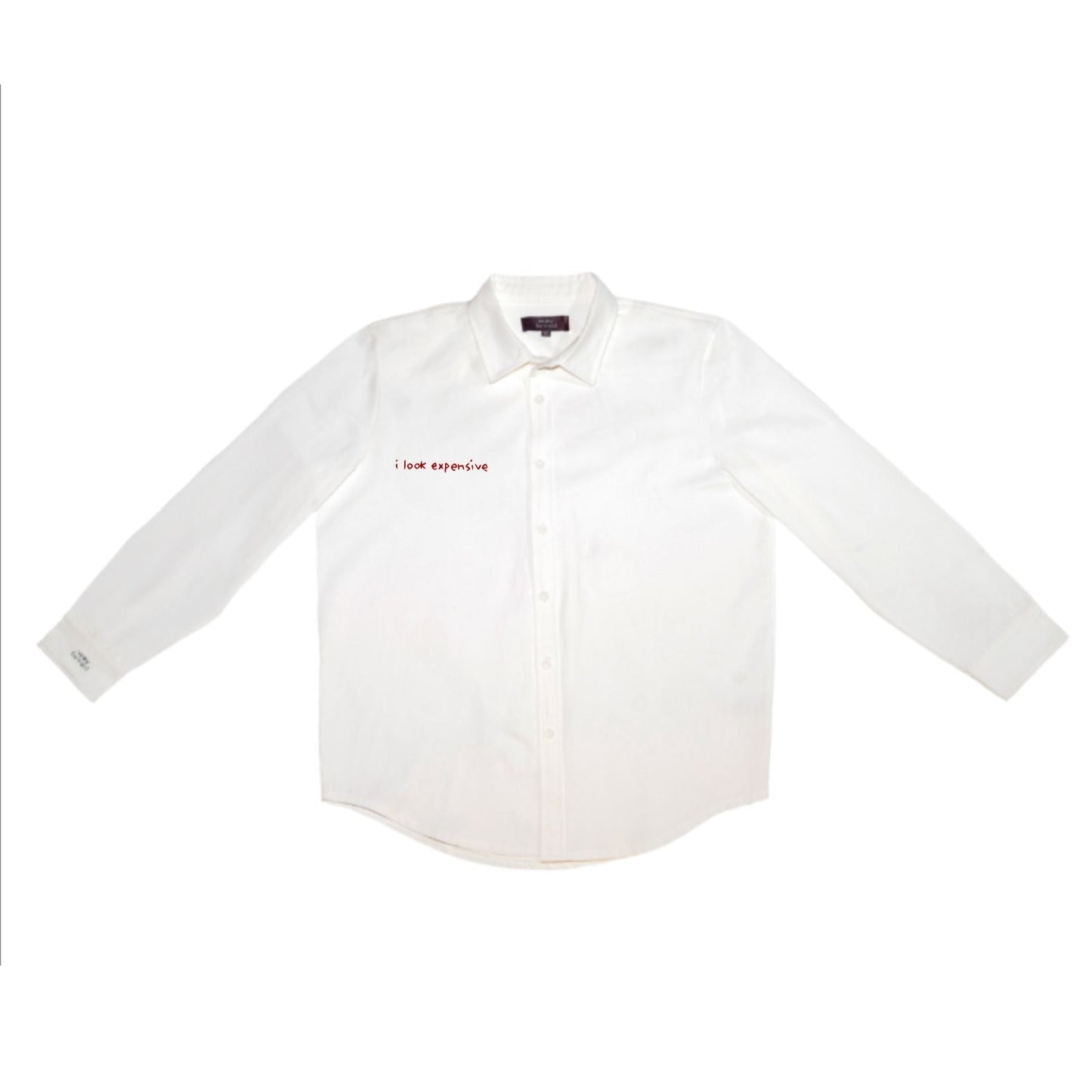 White shirt with red text 'i look expensive' on a white background