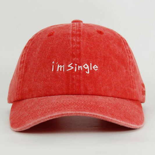 Red washed cap with 'i'm Single' text on a light gray background