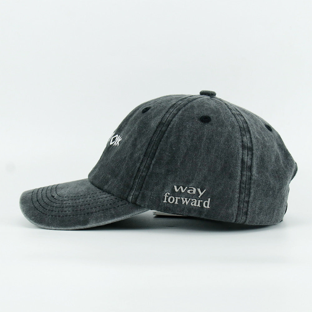 A black washed baseball cap with 'NEW YORK BOY' embroidered in white on the front.