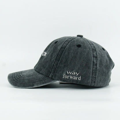 A black washed baseball cap with 'NEW YORK BOY' embroidered in white on the front.
