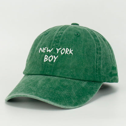 Green washed baseball cap with 'NEW YORK BOY' embroidered on the front