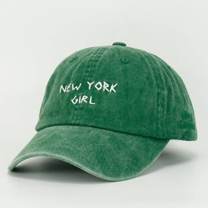 Washed Green baseball cap with 'NEW YORK GIRL' embroidered on the front