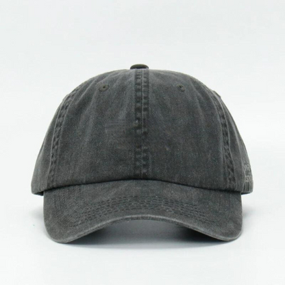 A black wash cotton cap with text embroidered on the front.