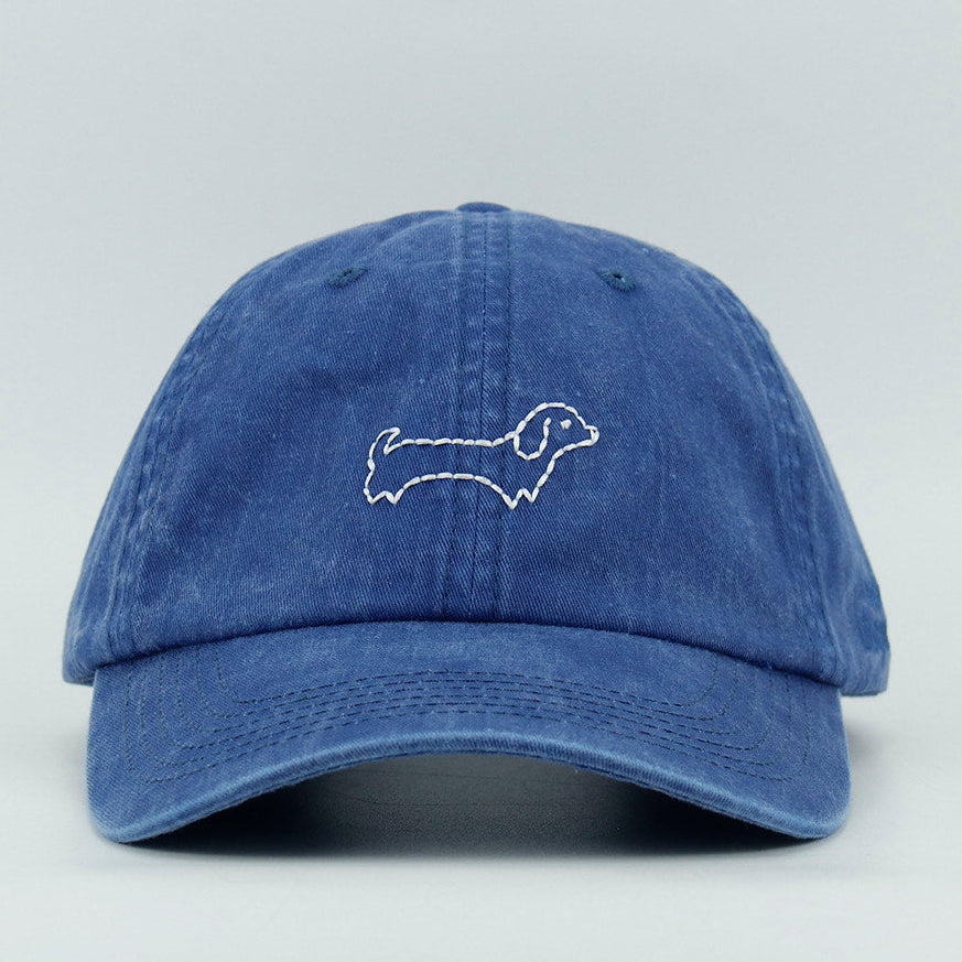 Blue cap with a wiener dog embroidery design