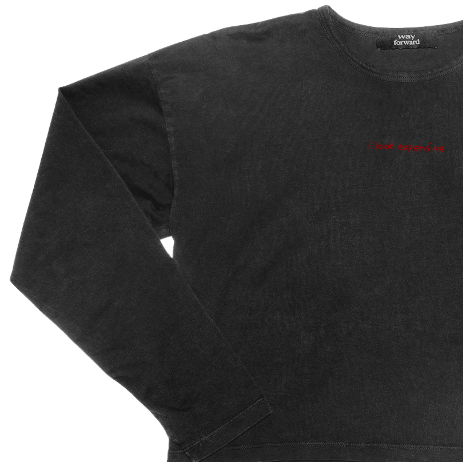 Black long sleeve crop tee with 'I look expensive' red text embroidery on the chest.