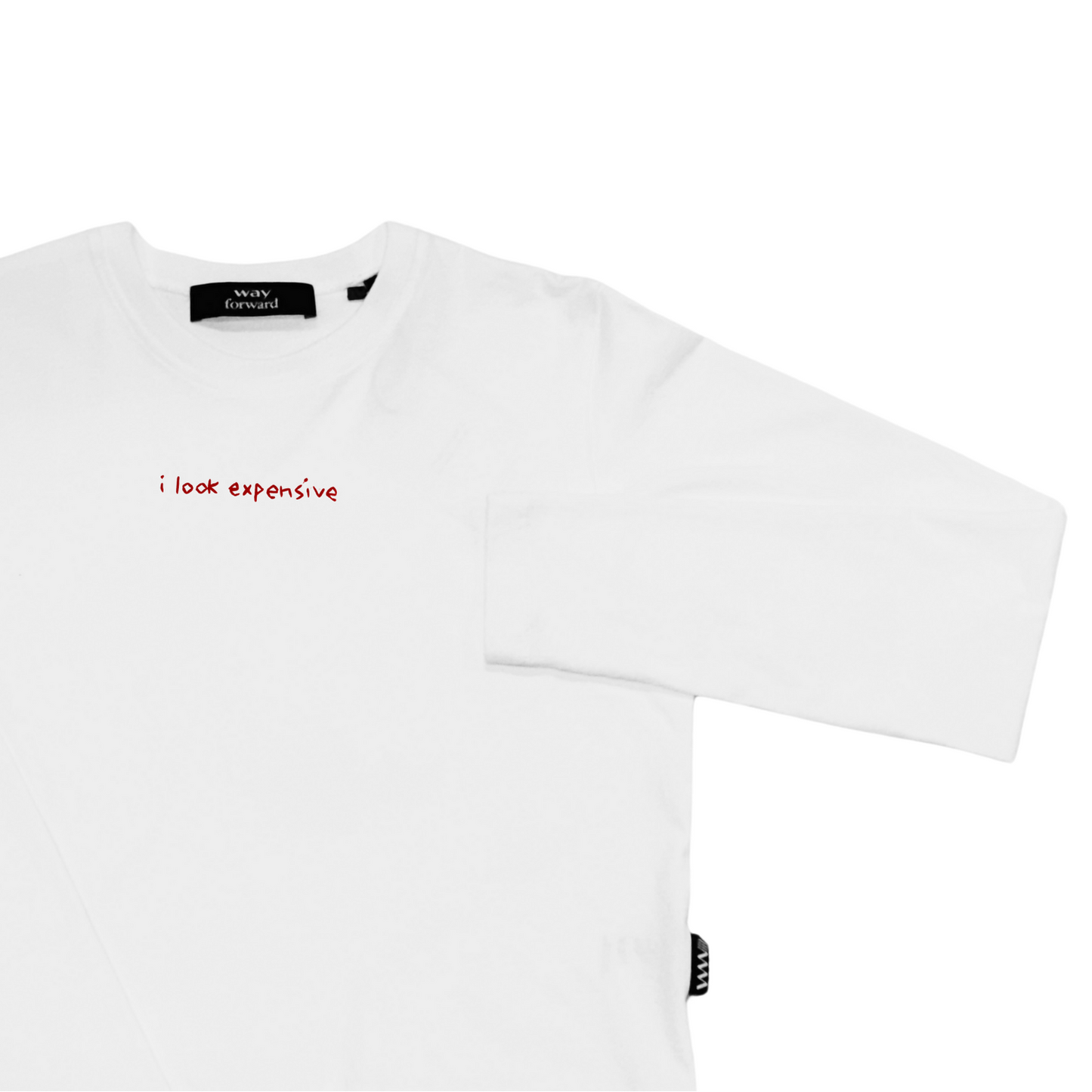 White long sleeve crop tee with 'I look expensive' red text embroidery on the chest.