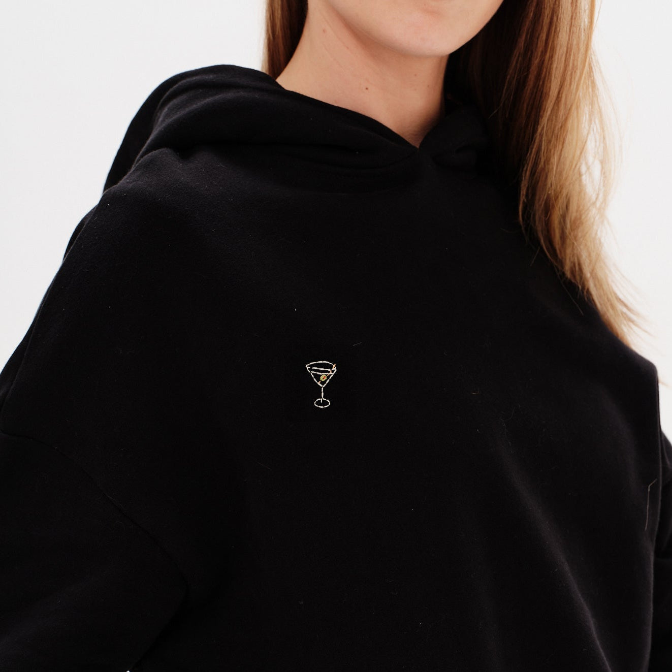 Premium black hoodie with a small martini embroidery