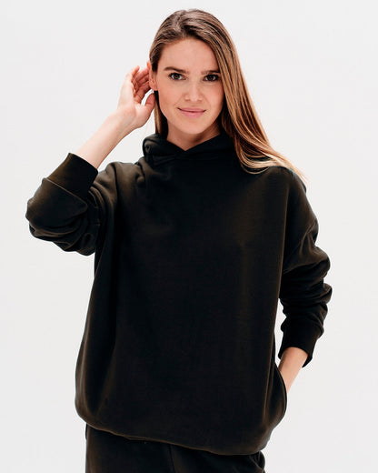 Woman wearing a black hoodie