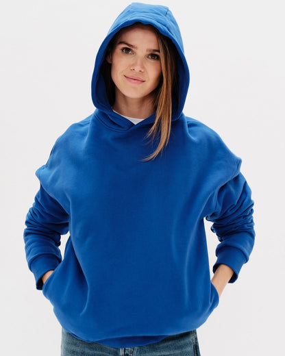 Woman wearing a blue hoodie