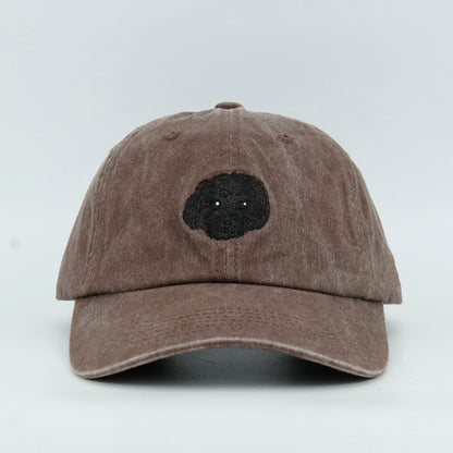 Brown cap with a black dog embroidery