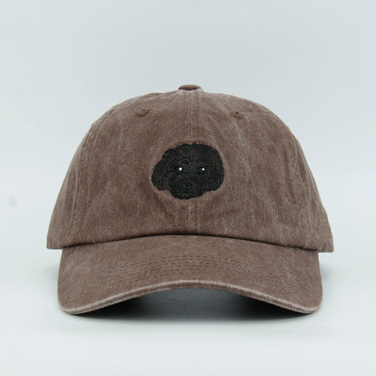 Brown cap with a black dog embroidery