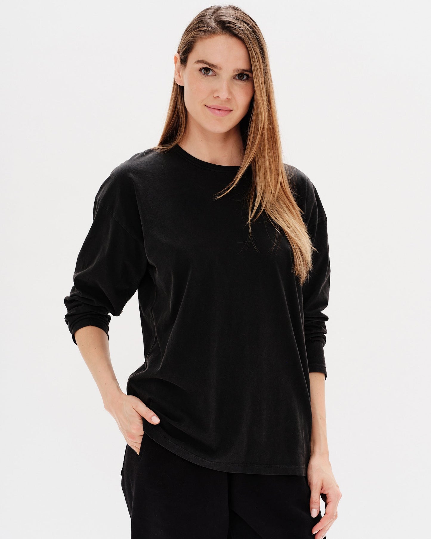 Woman wearing a black long-sleeve t-shirt