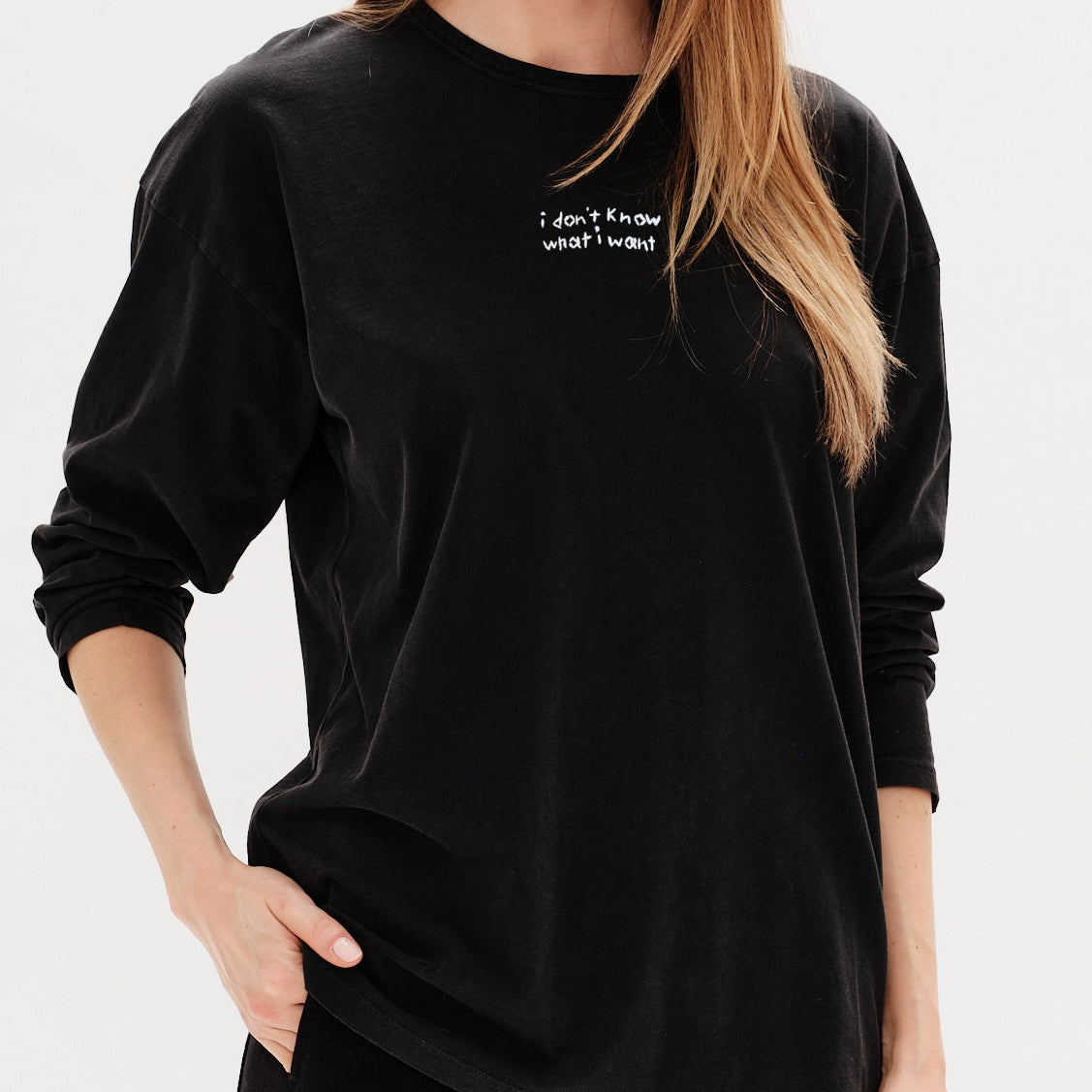 Black long sleeve t-shirt with I 
don't know what i want embroidery