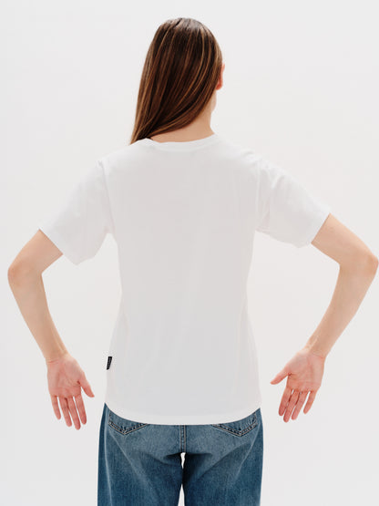 Woman wearing a white t-shirt with New York Boy embroidery