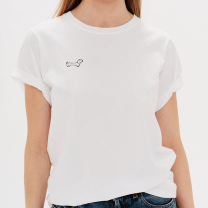 Woman wearing a white t-shirt with Wiener Dog embroidery