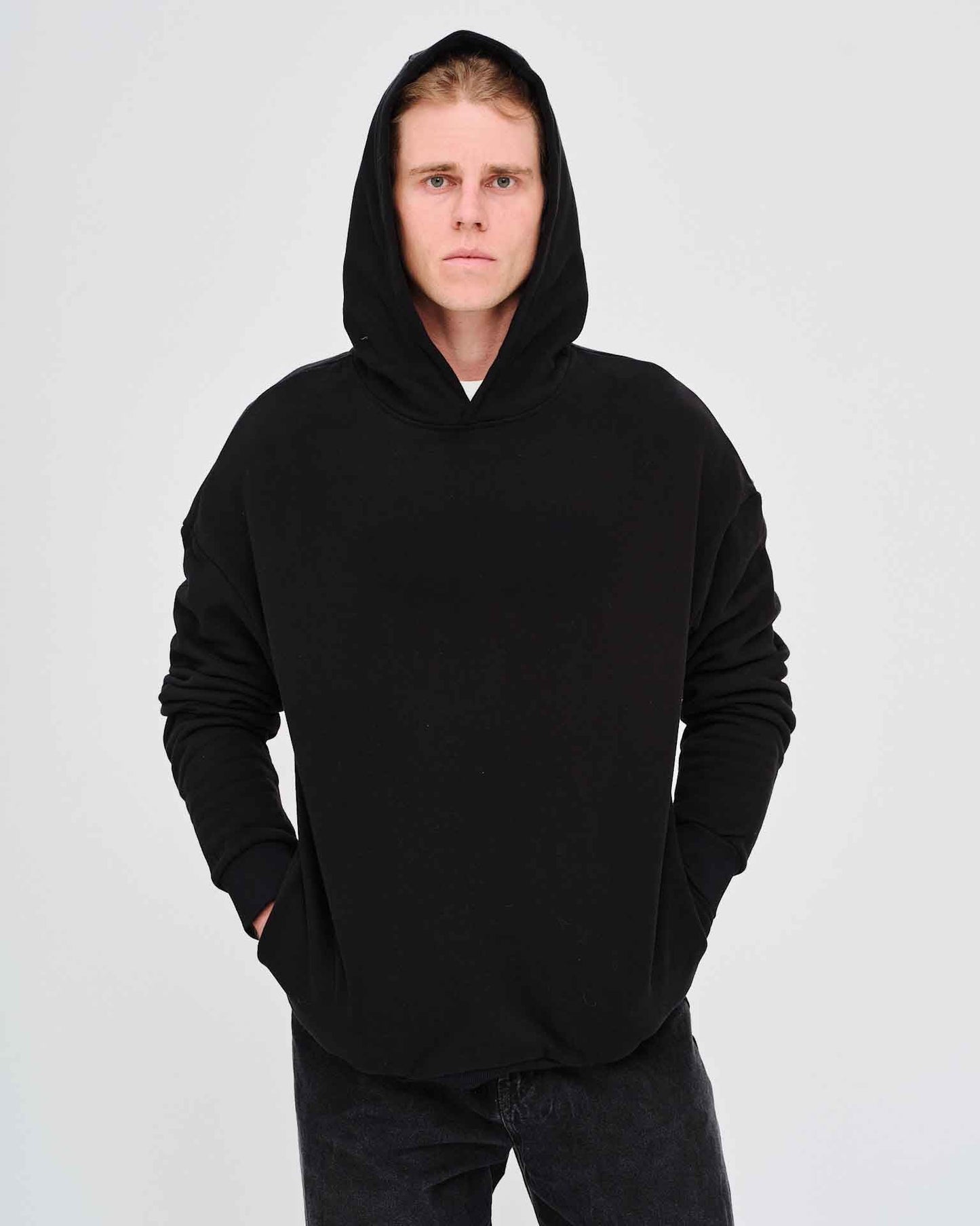 Man wearing a black hoodie 
